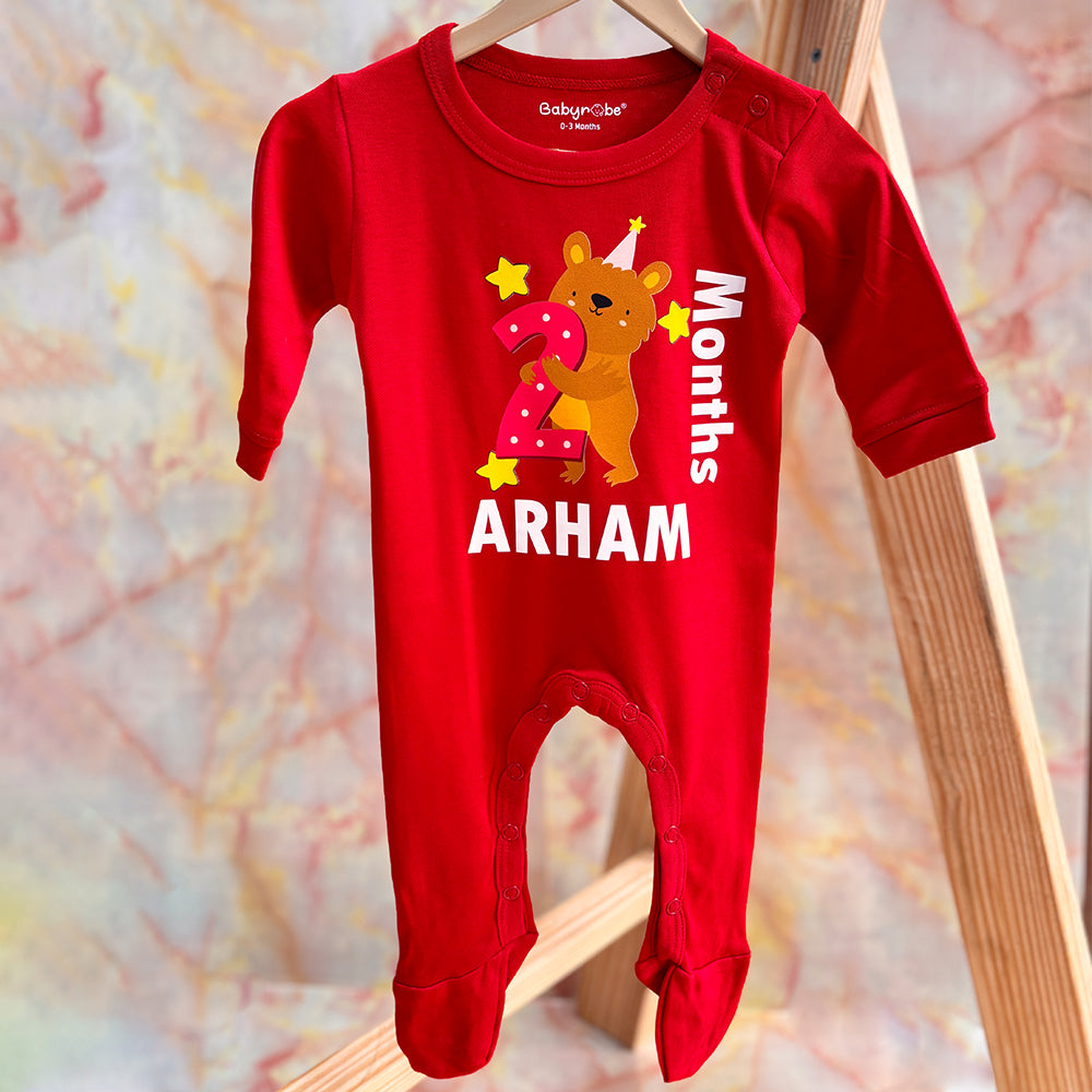 "Soft and comfortable baby jumpsuit with custom name and design" custom birthday onesie featuring their name and age.