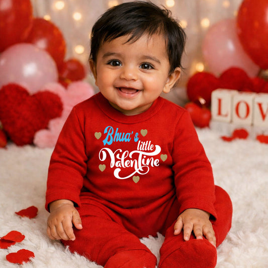Child wearing a red 'Bhau's Little Valentine' outfit with heart decorations and balloons in the background.