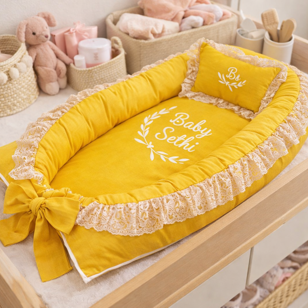 Yellow baby crib with decorative elements on a changing table