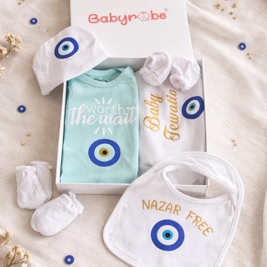Baby clothing set with 'Baby Telatiyo' and 'Nazar Free' text, featuring baby bibs and a shirt, on a light background.