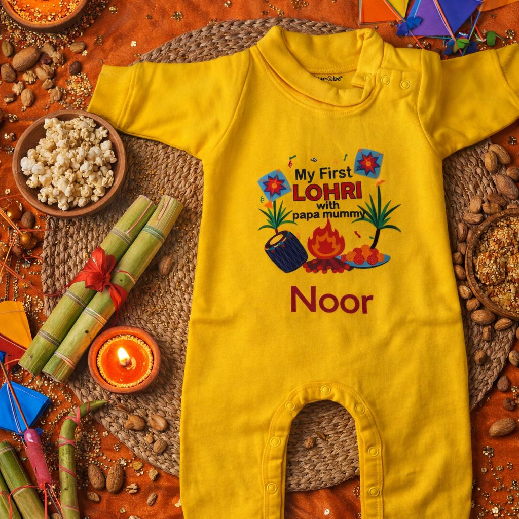 Yellow baby romper with 'My First Lohri' text and 'Noor' name on a festive background.