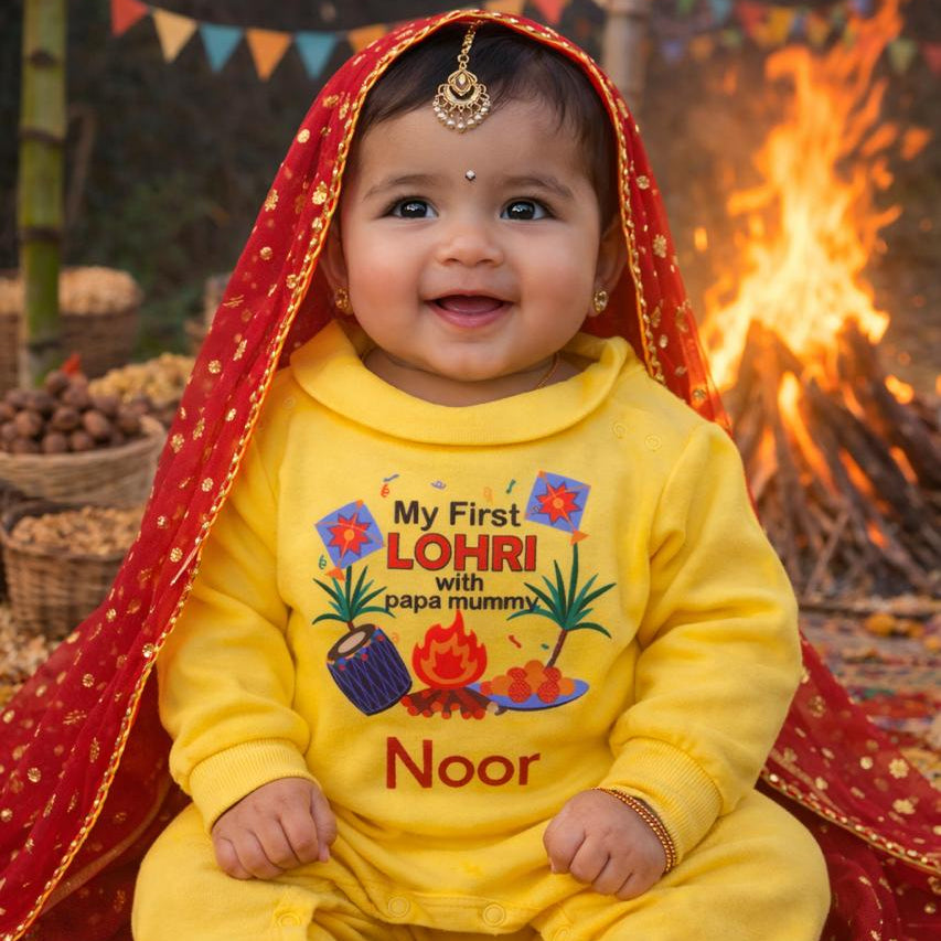 Baby in a yellow outfit with 'My First Lohri' text, sitting in front of a fire and colorful flags.