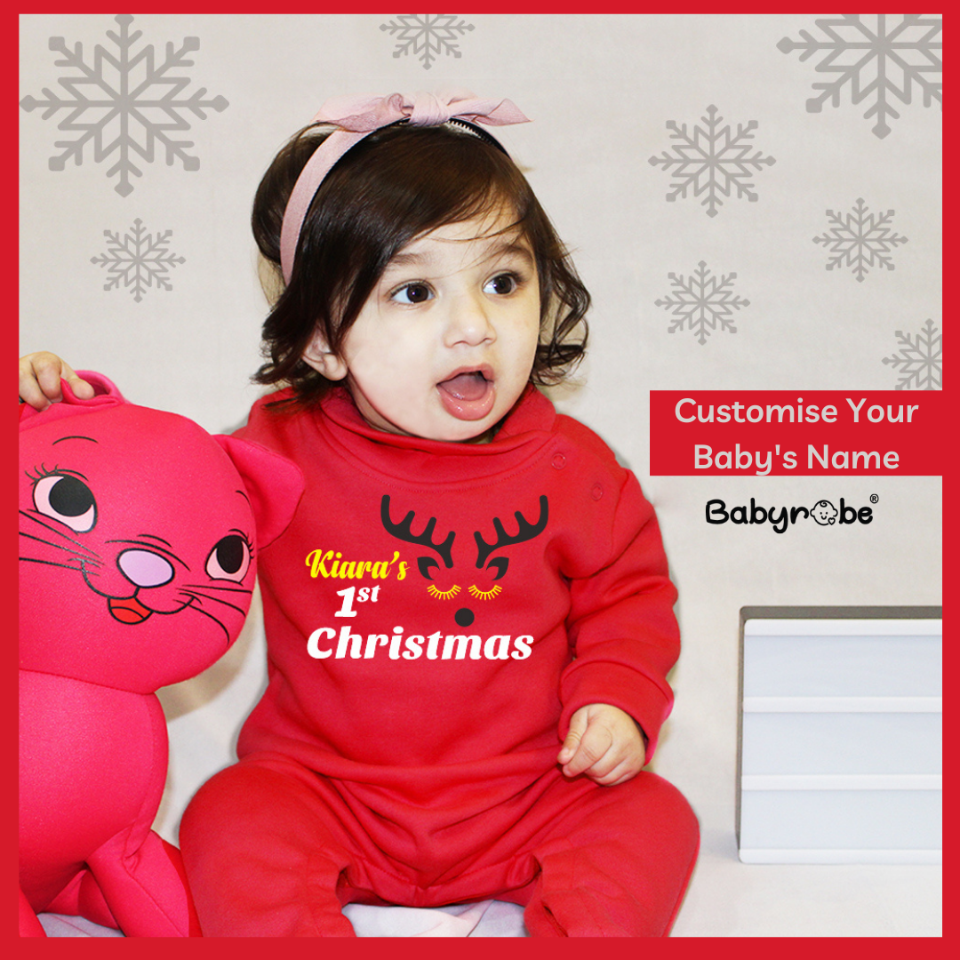 "Christmas baby bodysuit with ‘Santa’s Little Helper’ in red."