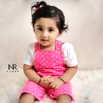 "Custom baby onesie & Dungaree Set with name and special design for gifts or photo shoots."